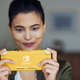 Nintendo Switch Lite (Yellow, Coral) | $200 | Amazon